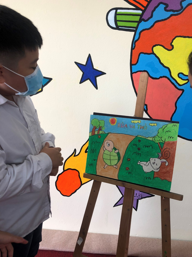 A picture containing text, person
Description automatically generated