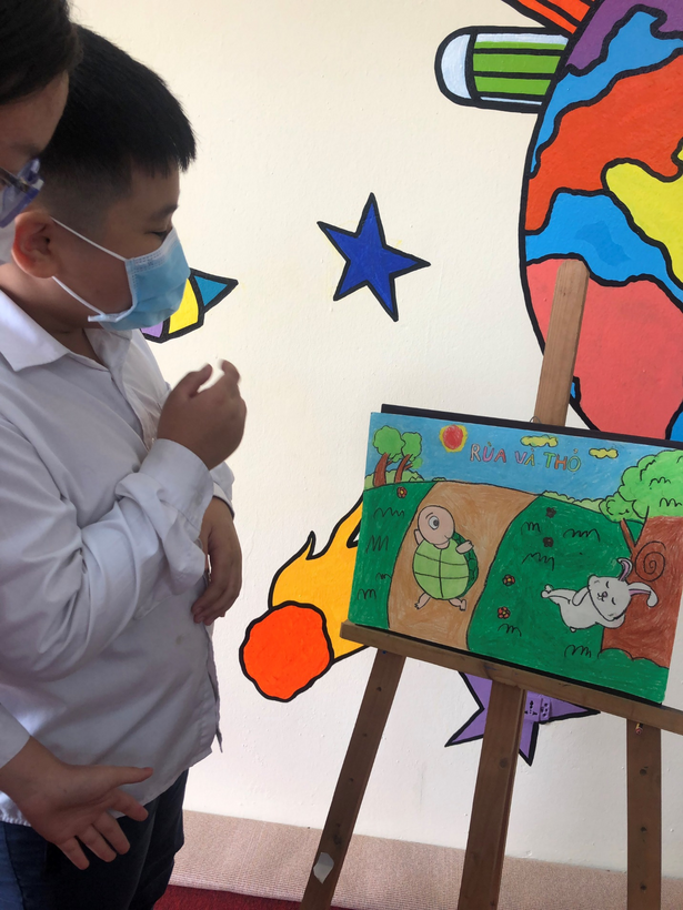 A picture containing text, person
Description automatically generated