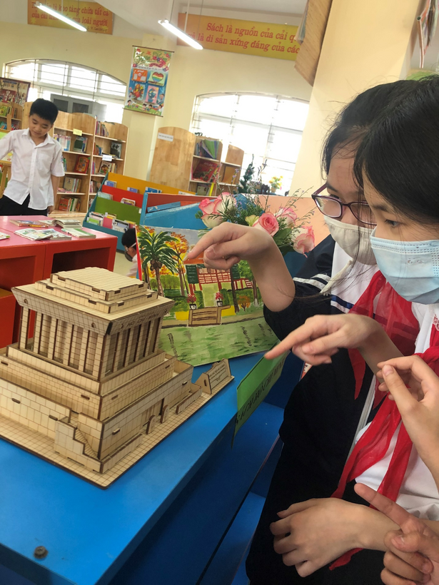 A picture containing text, person
Description automatically generated