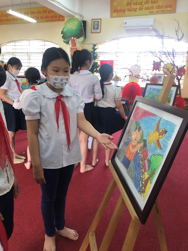 A group of people in a room
Description automatically generated with low confidence