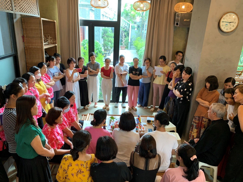 A group of people performing on stage

Description automatically generated with medium confidence