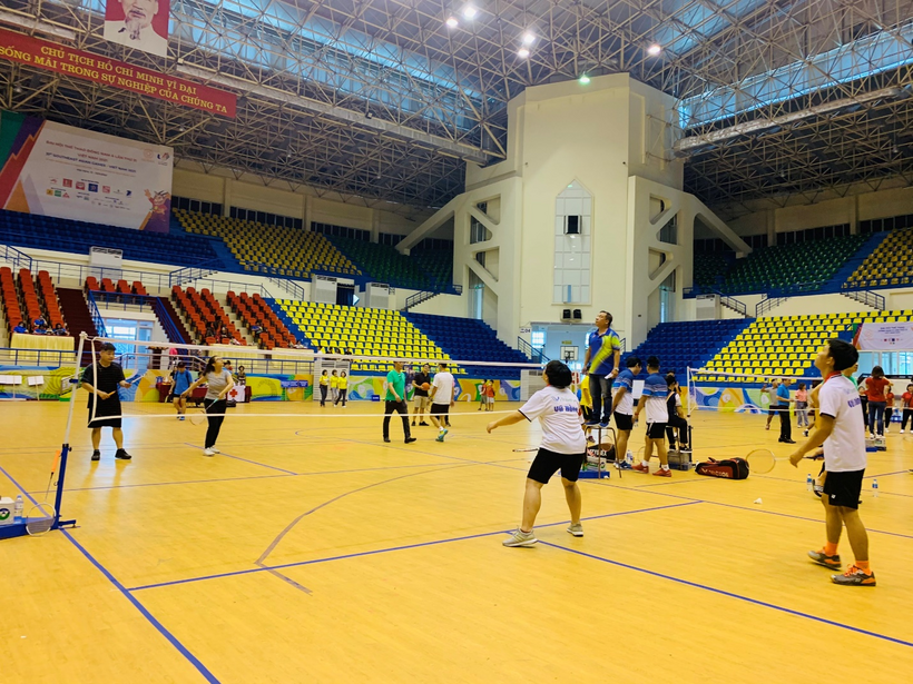 A group of people playing volleyball

Description automatically generated with medium confidence