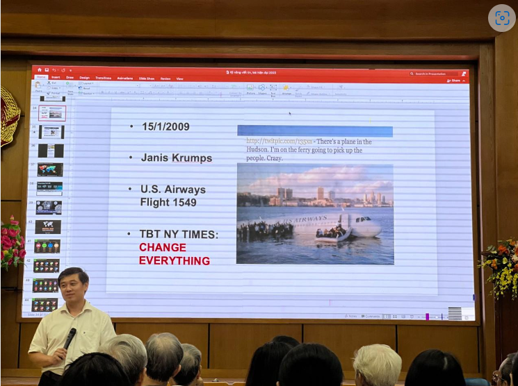 A person giving a presentation
Description automatically generated with medium confidence