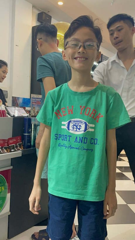 A group of people posing for the camera

Description automatically generated with medium confidence