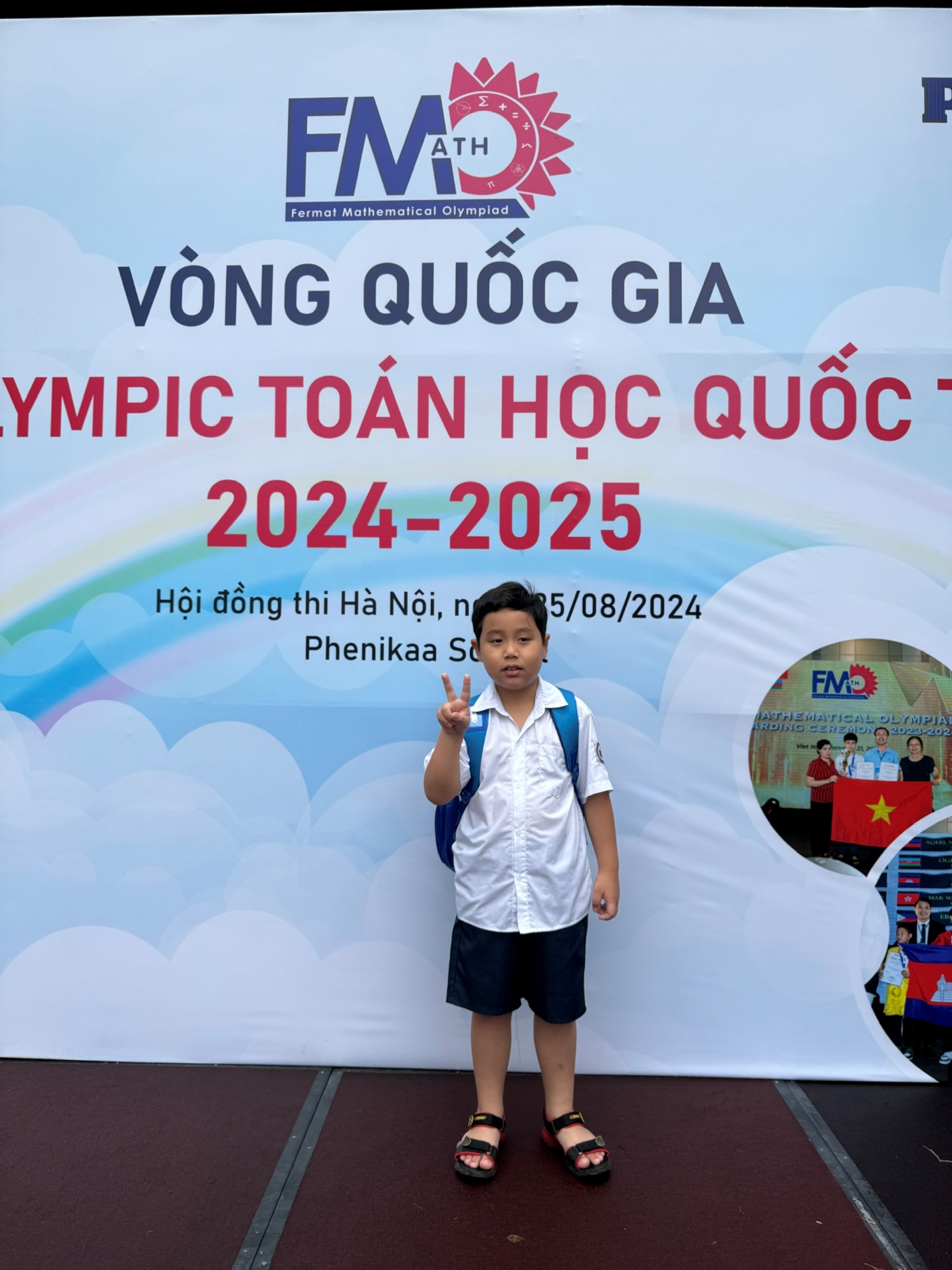 A child standing in front of a sign
Description automatically generated