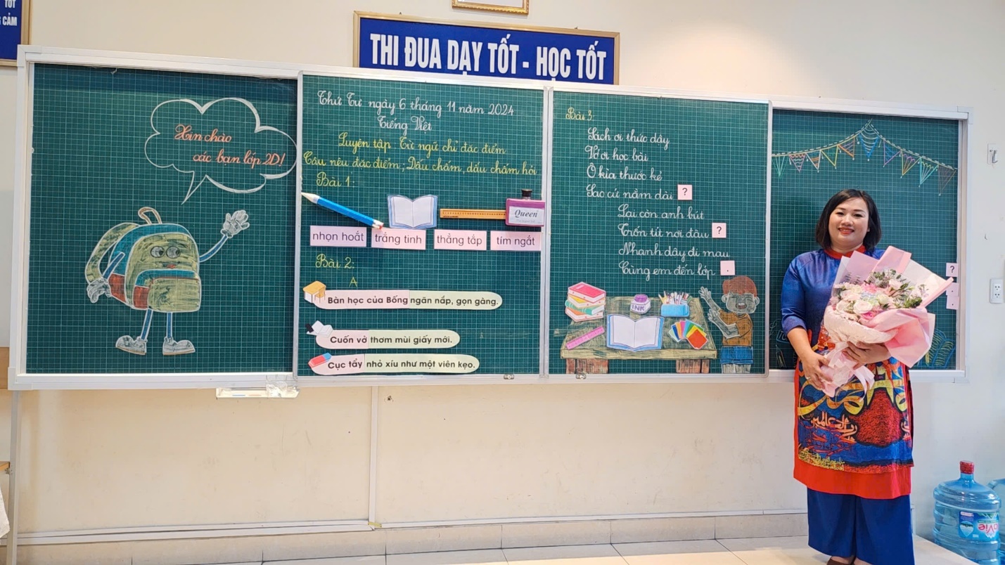 A person standing next to a board
Description automatically generated