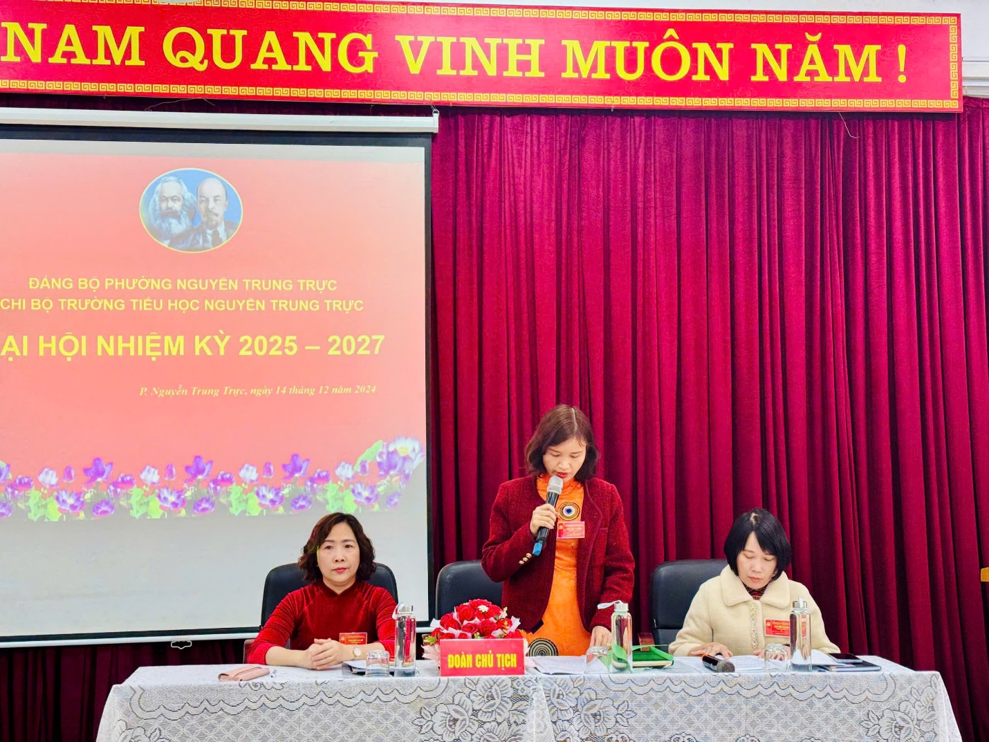 A group of women sitting at a table
Description automatically generated