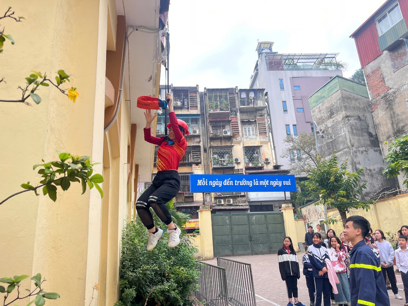 A person from a building

Description automatically generated