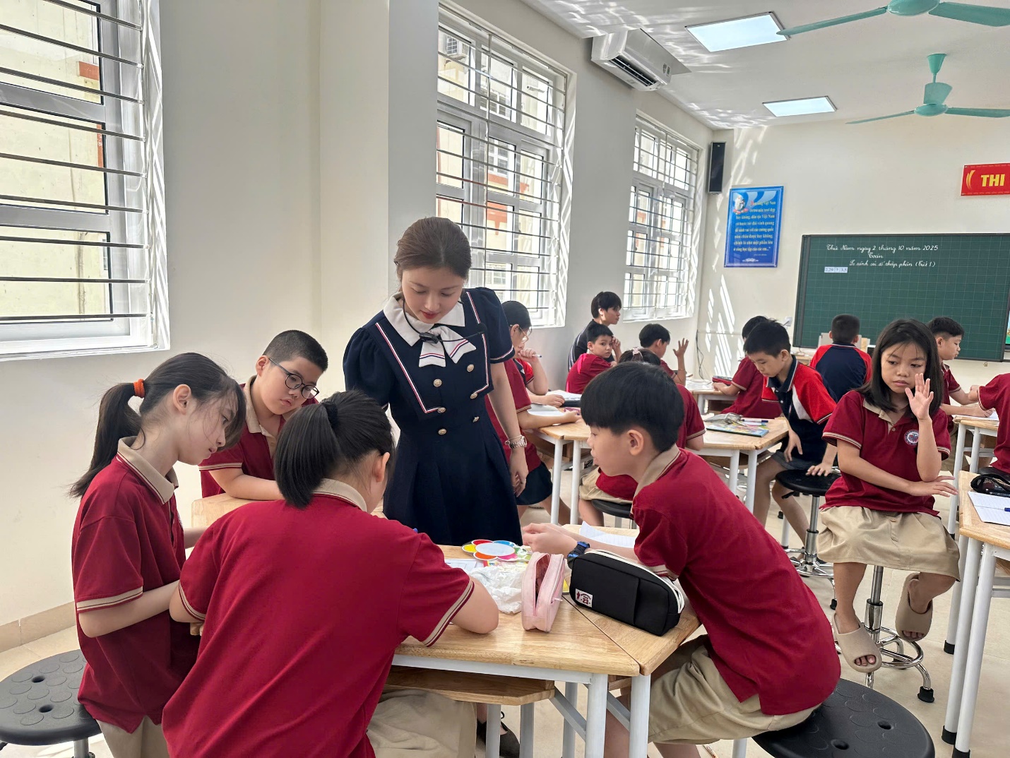 A group of children in a classroom
AI-generated content may be incorrect.