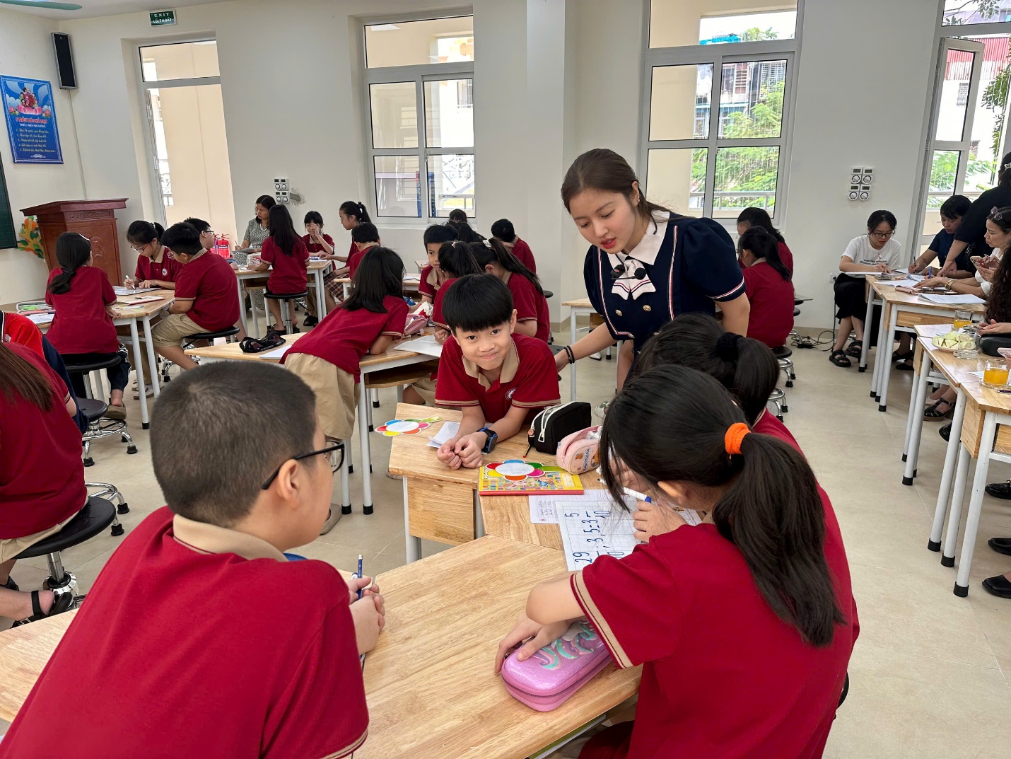 A group of children in a classroom
AI-generated content may be incorrect.