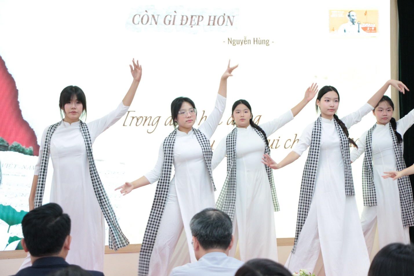 A group of women in white dresses

AI-generated content may be incorrect.