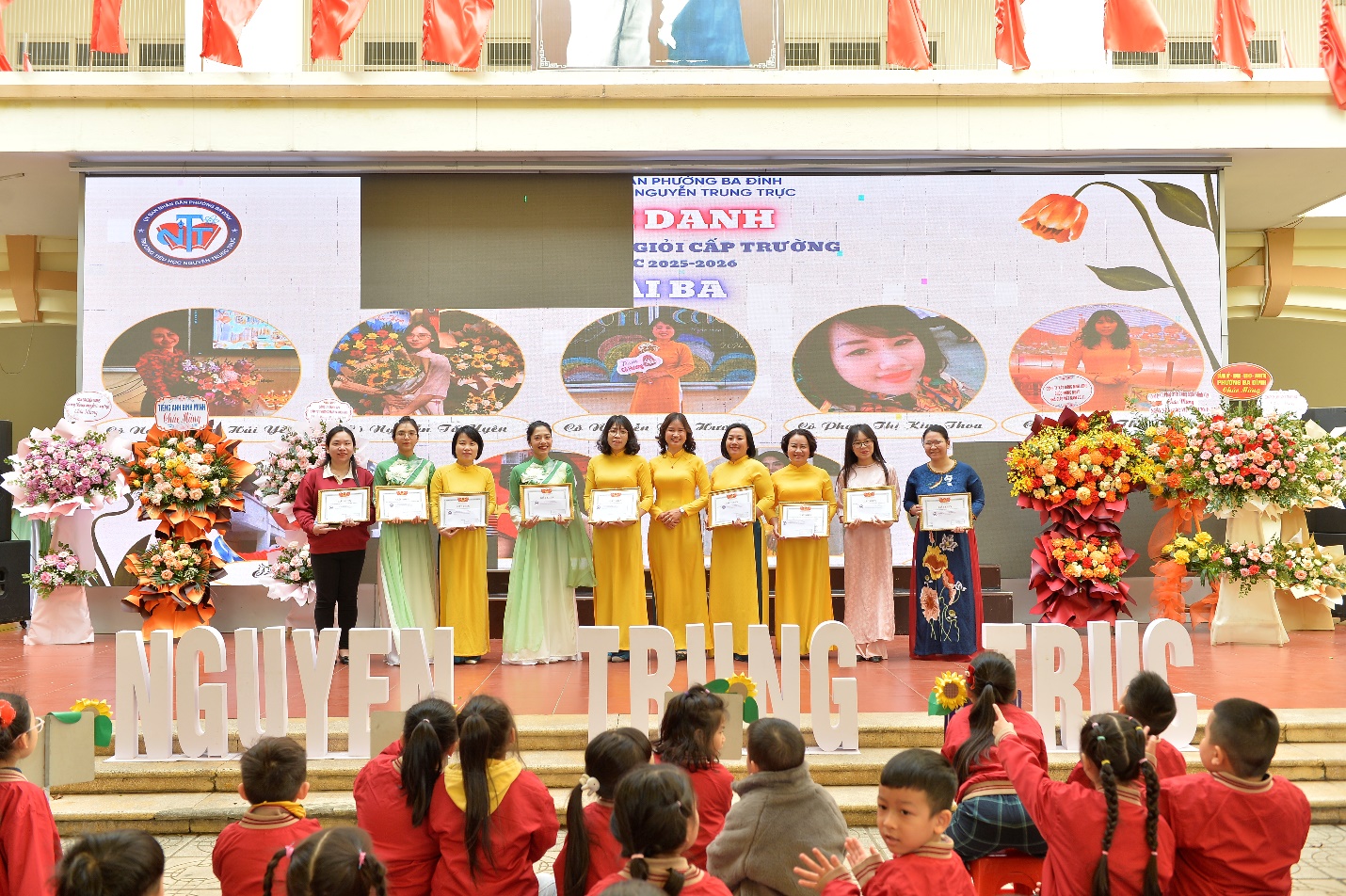 A group of women performing on stage

AI-generated content may be incorrect.