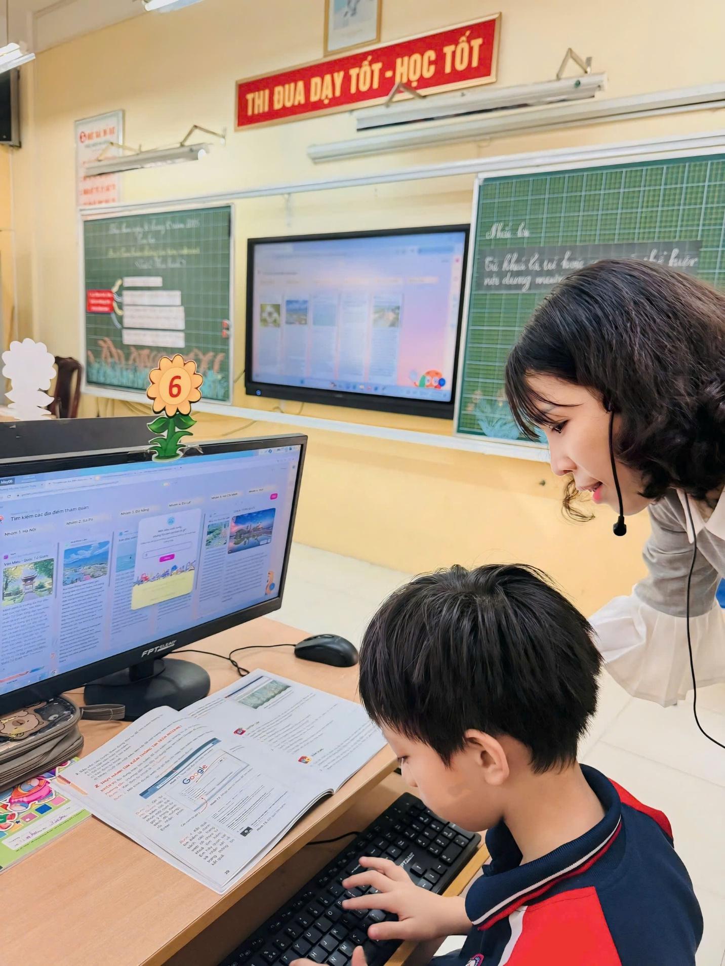 A person and child looking at a computer screen

AI-generated content may be incorrect.