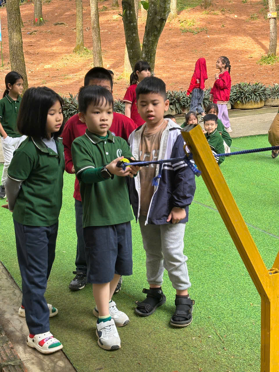 A group of children standing in a line

AI-generated content may be incorrect.