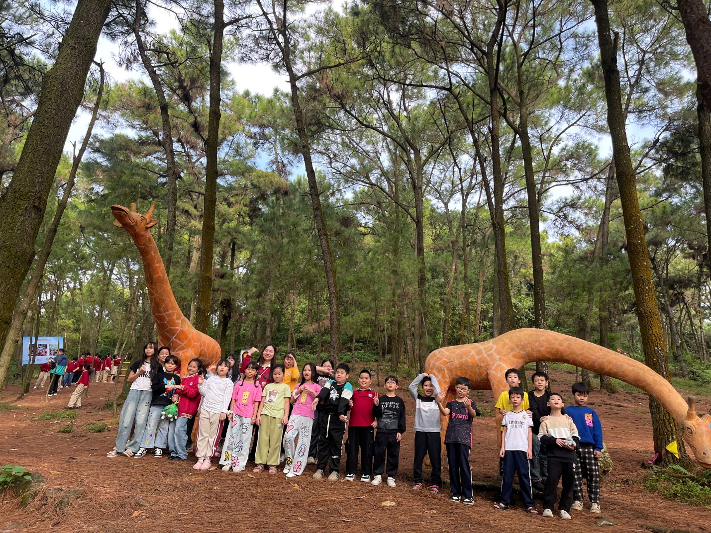A group of people posing for a photo in a forest

AI-generated content may be incorrect.
