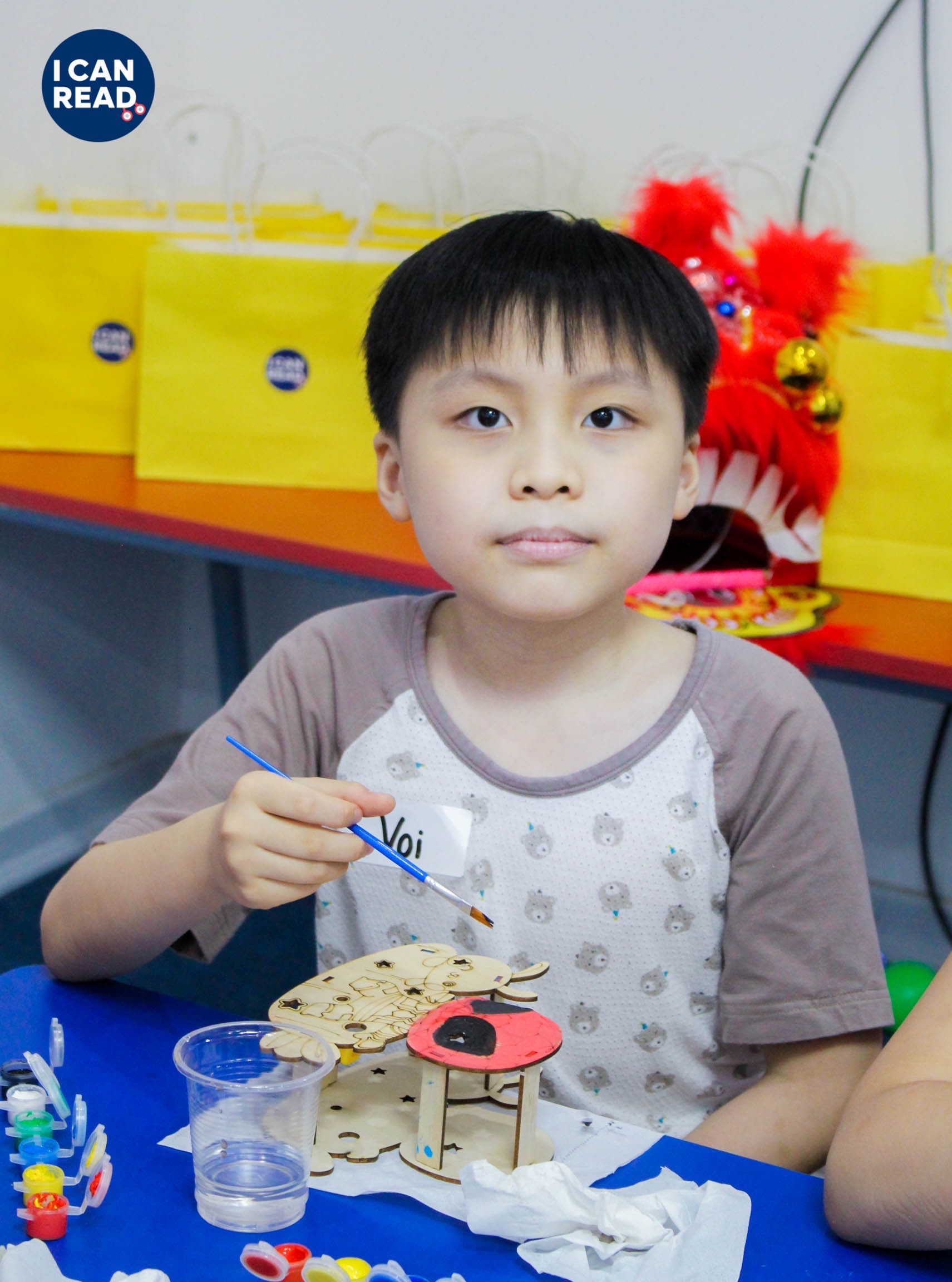 A child painting a toy
AI-generated content may be incorrect.