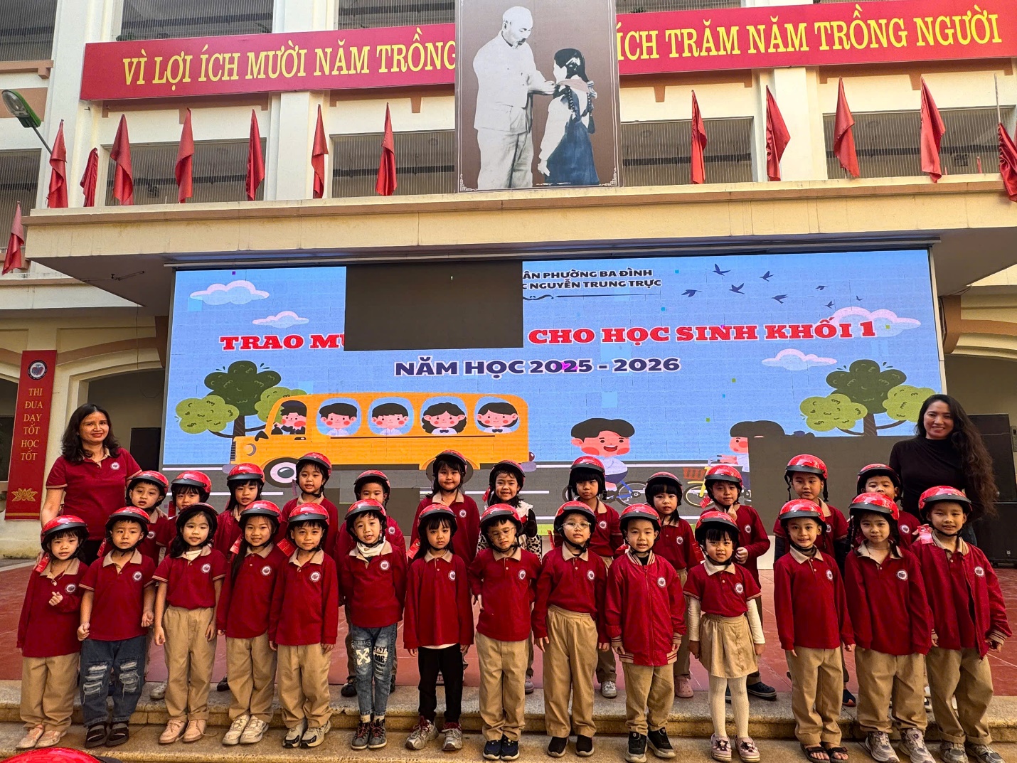 A group of children in red uniforms

AI-generated content may be incorrect.