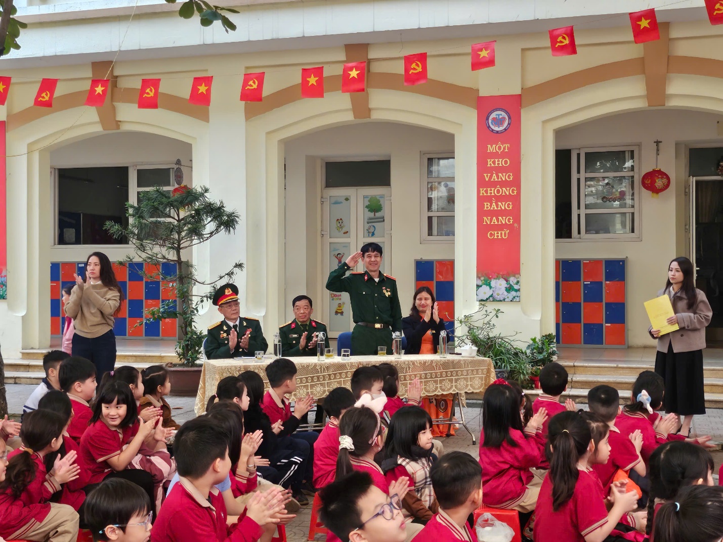 A group of people in uniform standing in front of a building

AI-generated content may be incorrect.