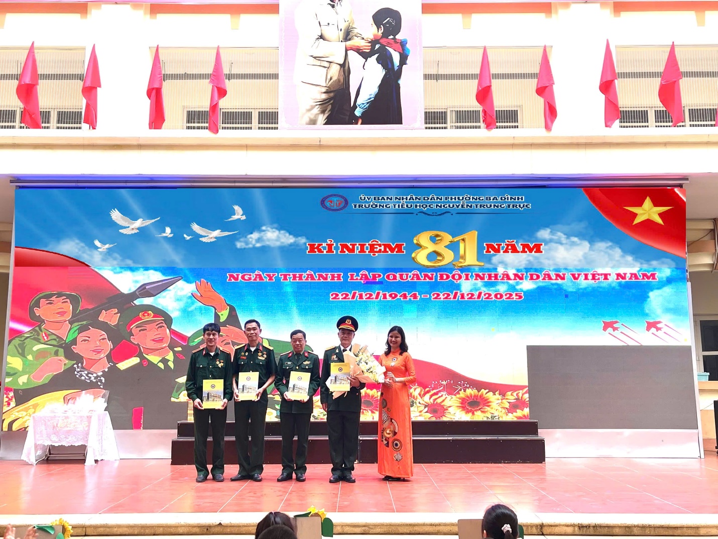 A group of people on a stage

AI-generated content may be incorrect.