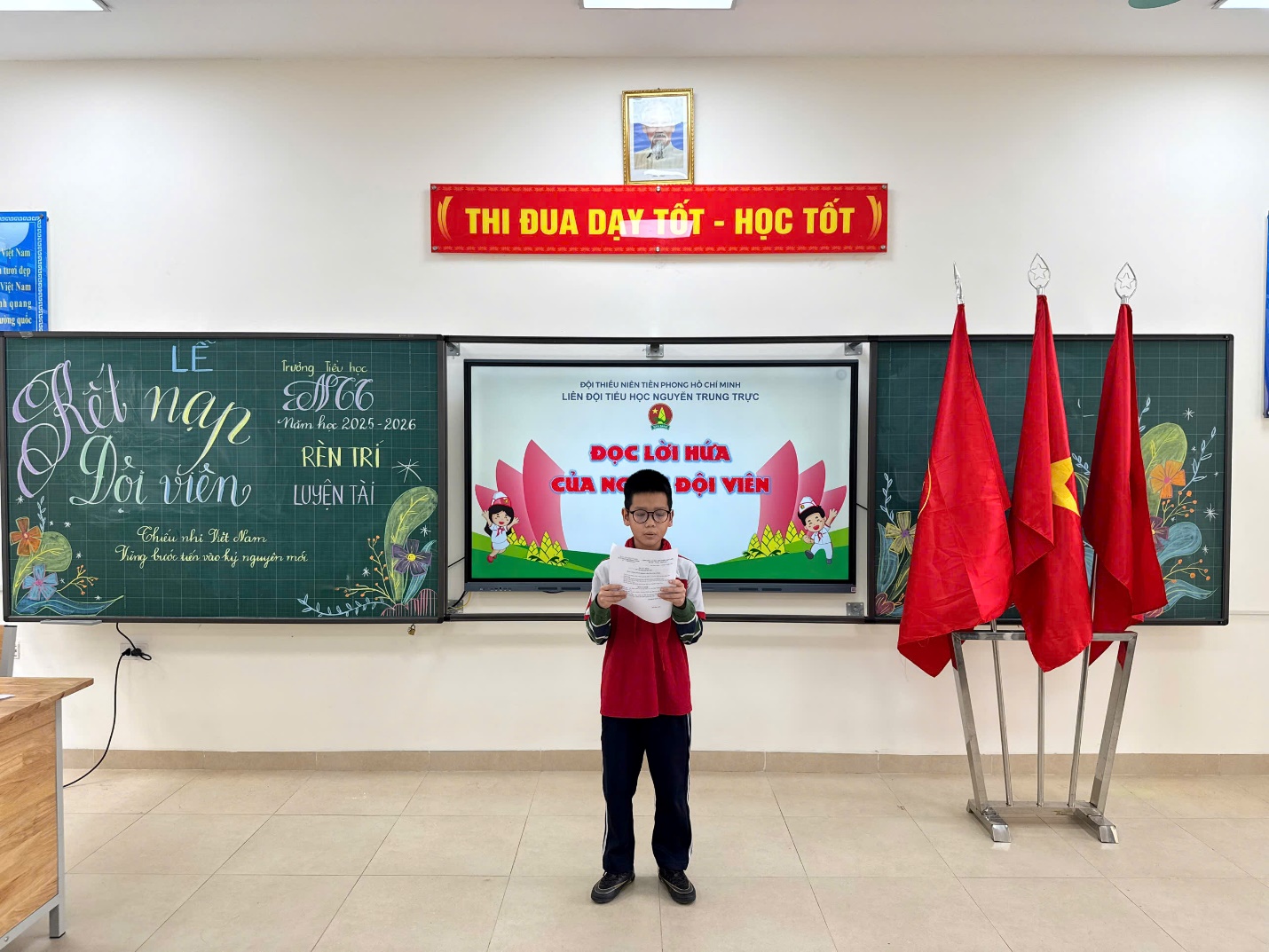 A child standing in front of a chalkboard

AI-generated content may be incorrect.
