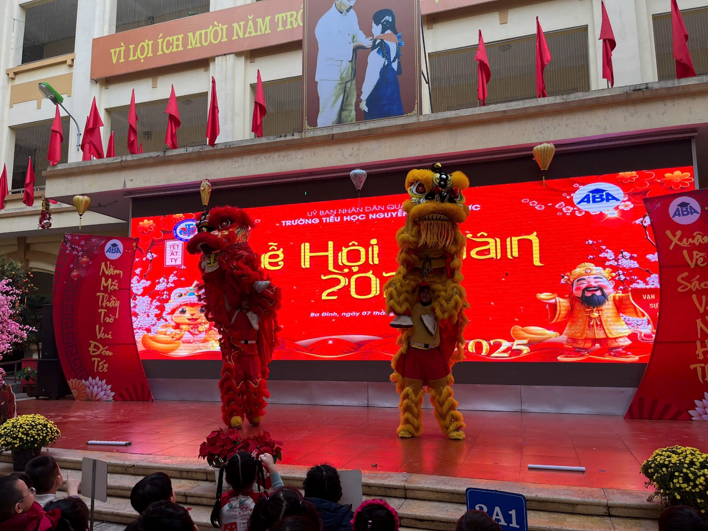 Two people in clothing on a stage

Description automatically generated