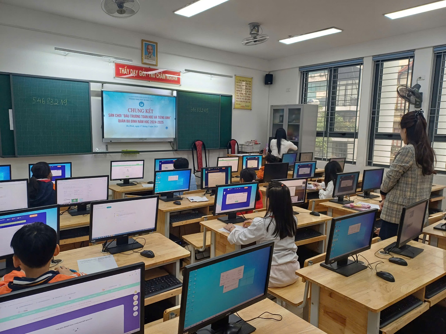 A group of people in a classroom with computers

AI-generated content may be incorrect.