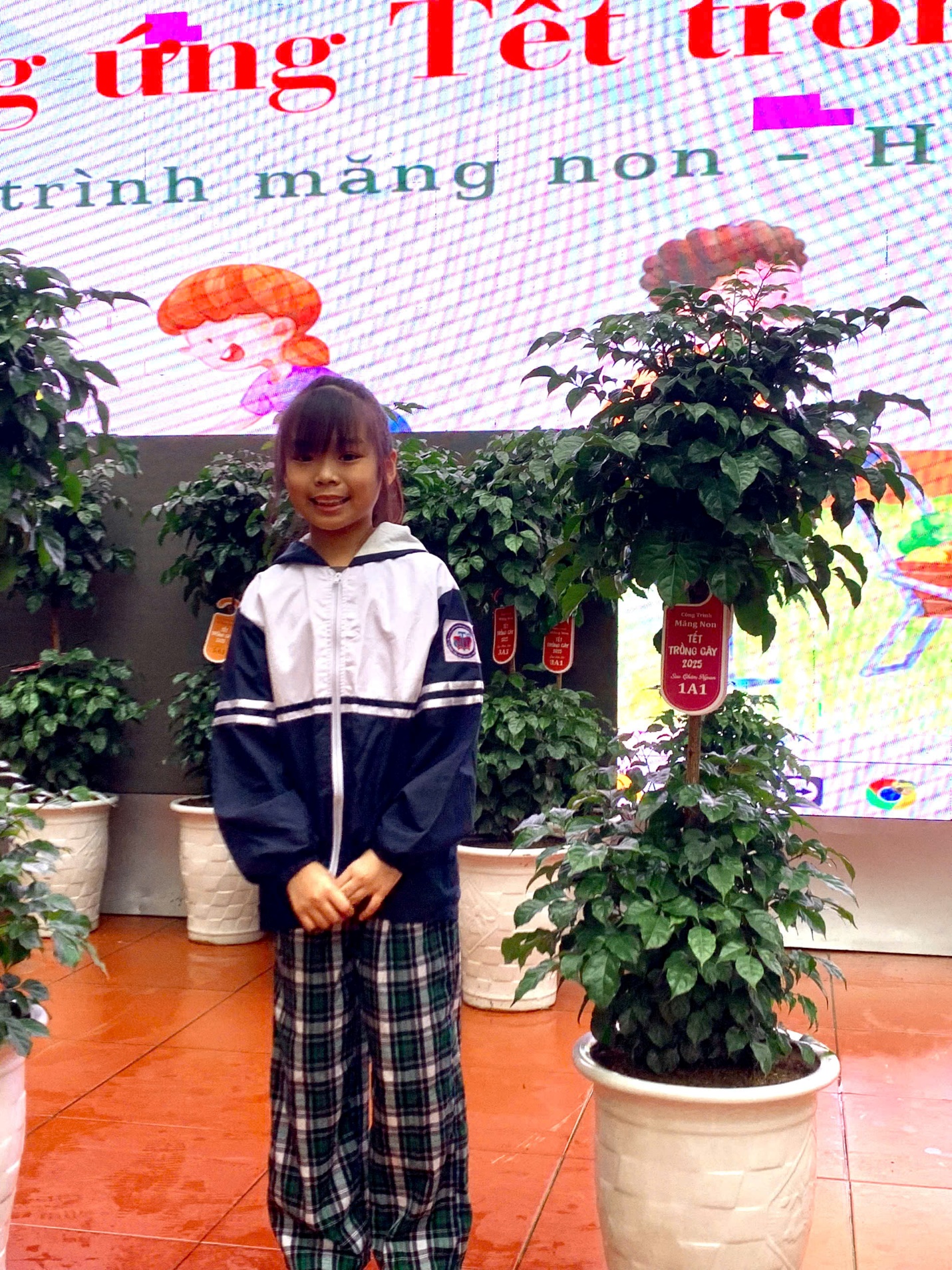 A child standing in front of plants
AI-generated content may be incorrect.