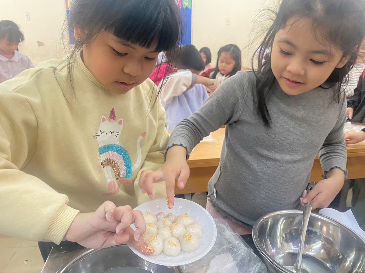 A group of girls preparing food
AI-generated content may be incorrect.