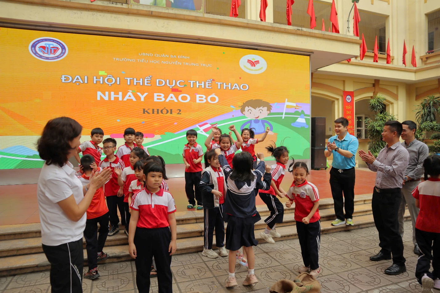 A group of children standing on steps

AI-generated content may be incorrect.