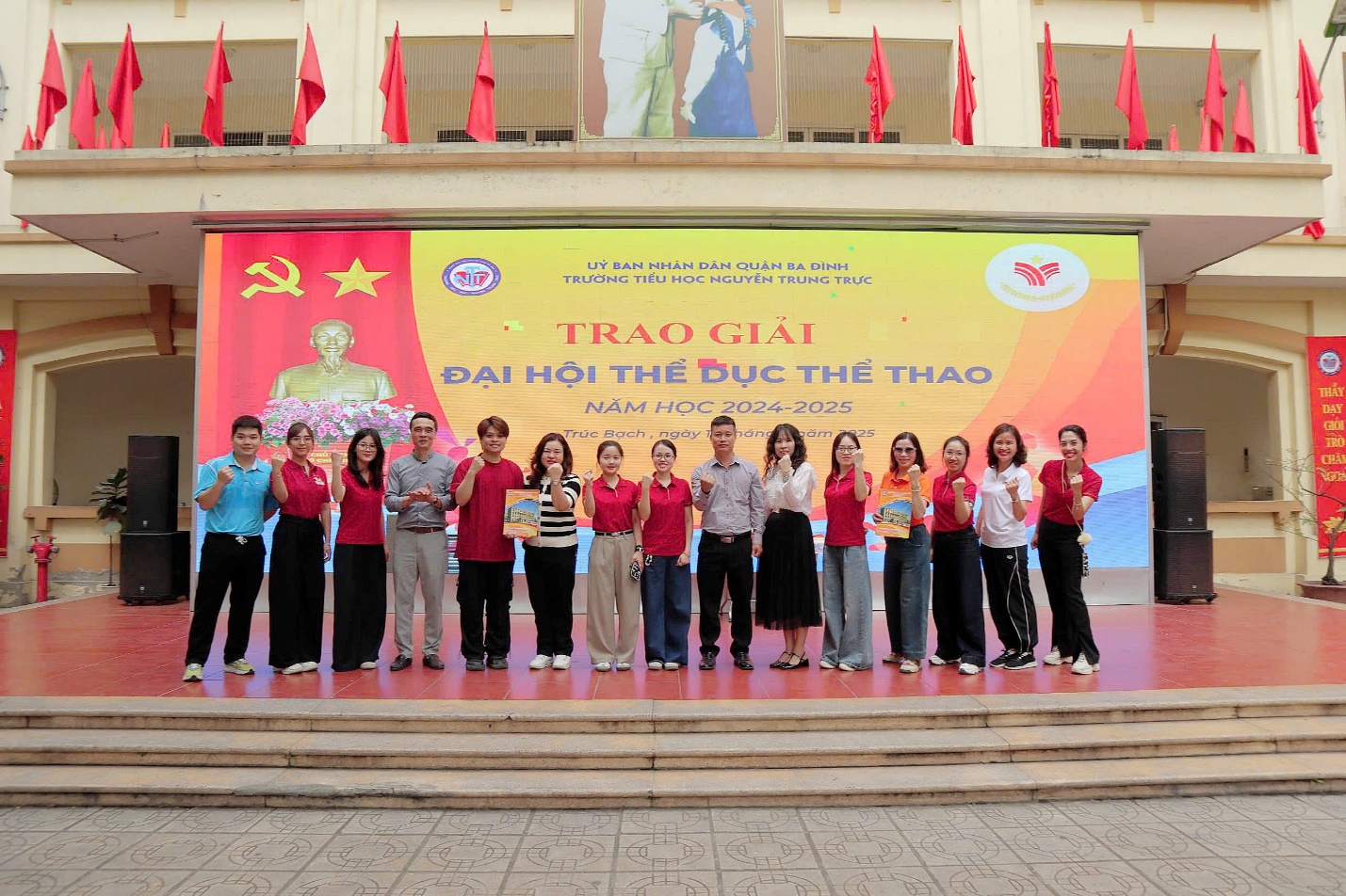 A group of people standing on steps

AI-generated content may be incorrect.