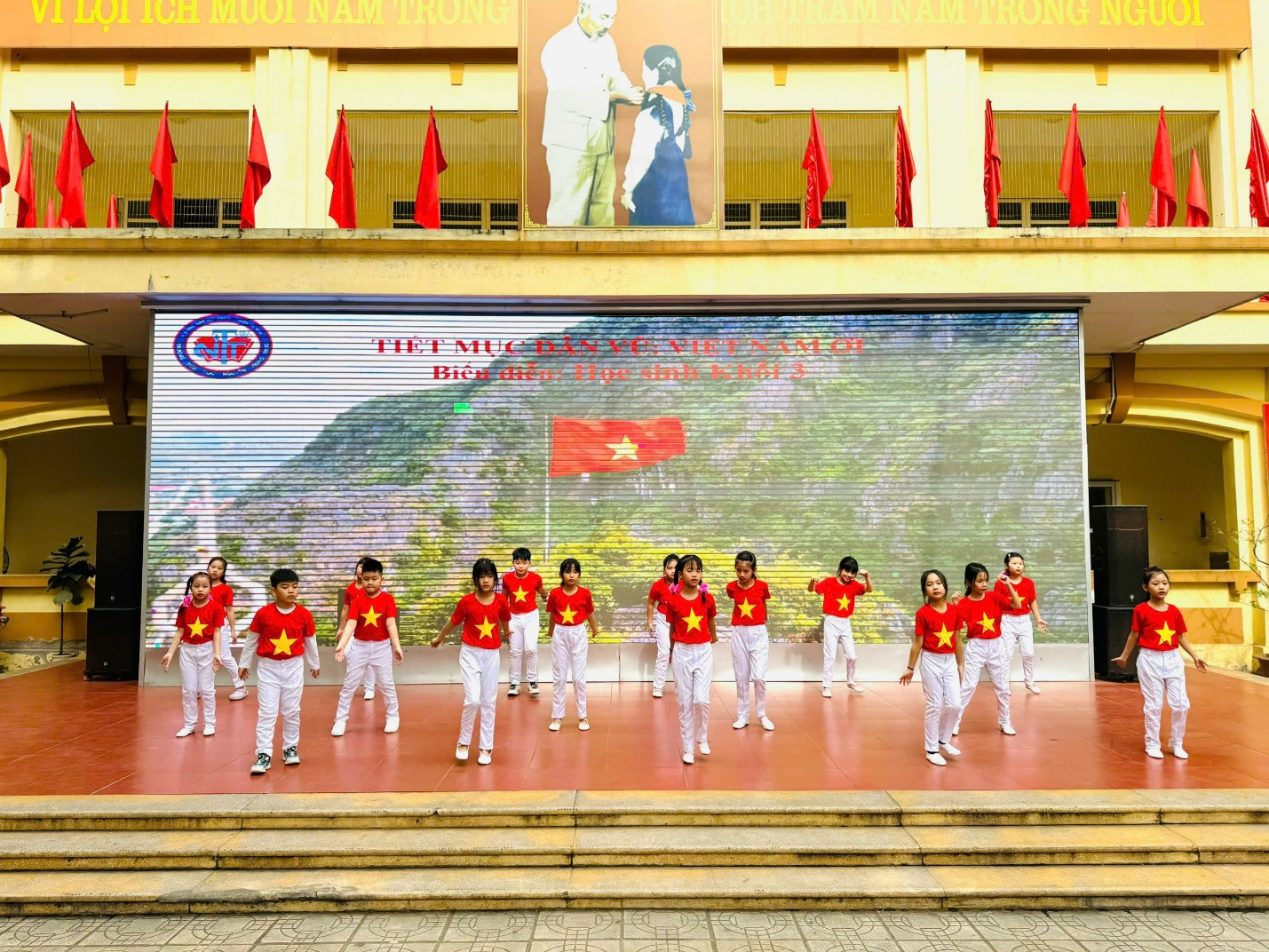 A group of people in red shirts on a stage

AI-generated content may be incorrect.