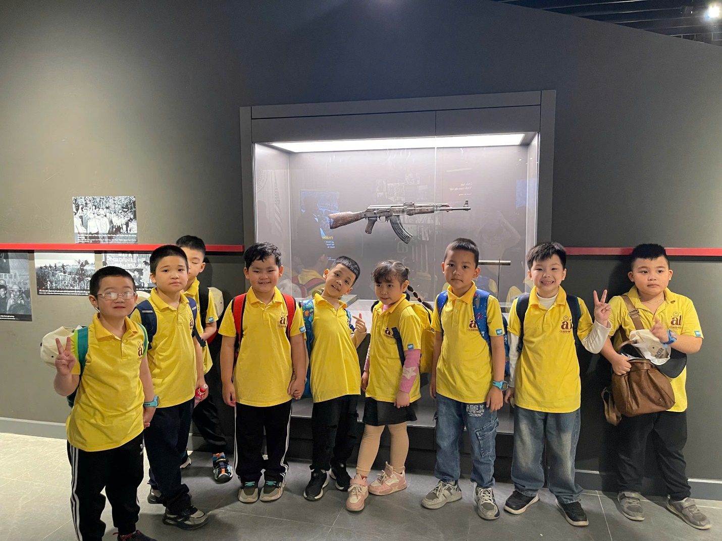 A group of children in yellow shirts
AI-generated content may be incorrect.