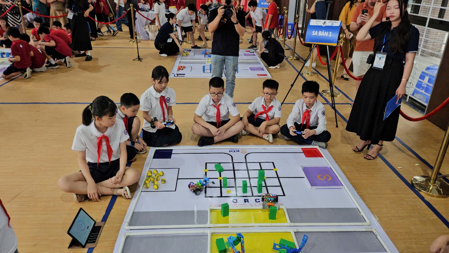 A group of children sitting on the floor with a game

AI-generated content may be incorrect.