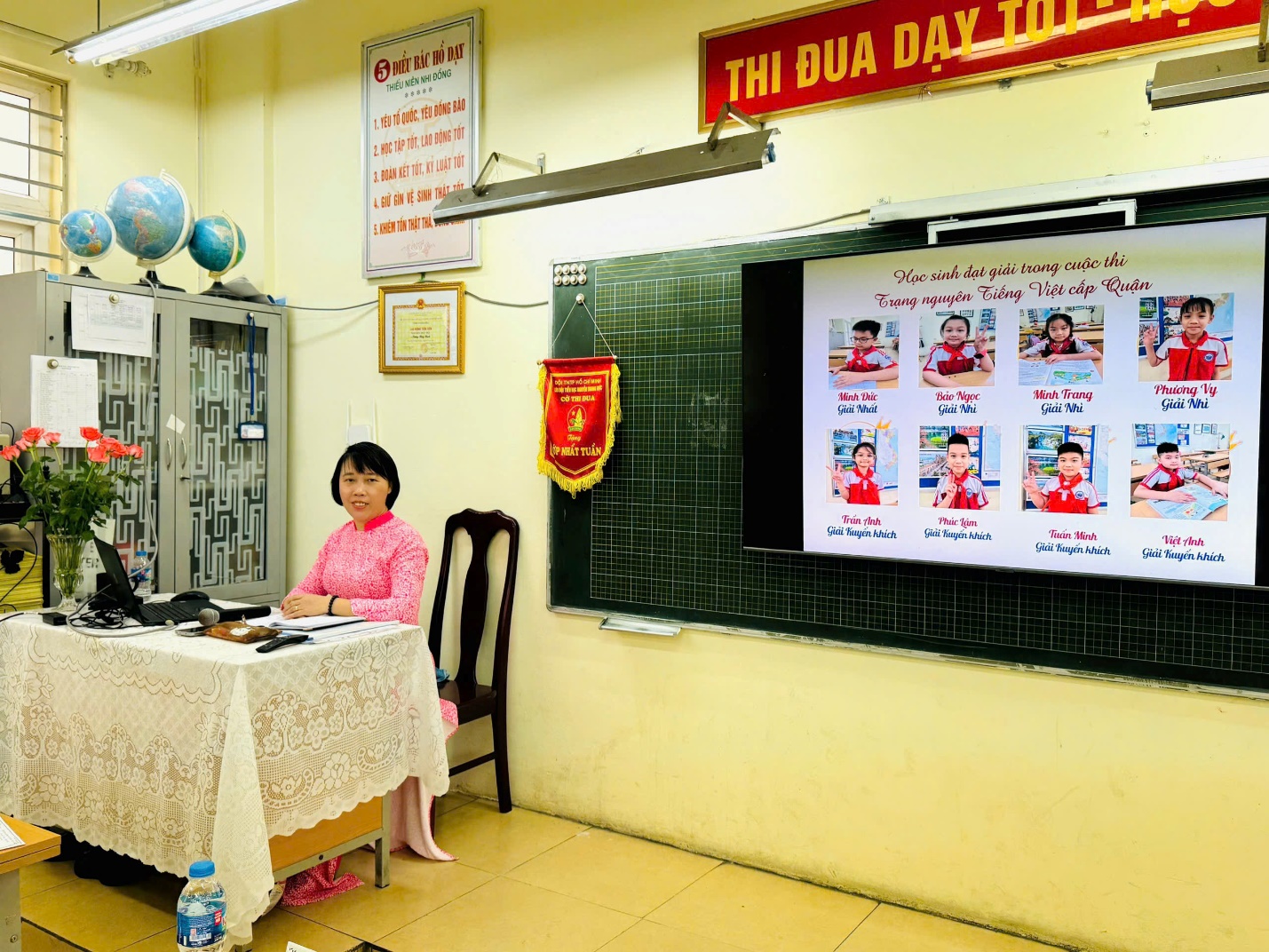 A person sitting at a desk in front of a chalkboard

AI-generated content may be incorrect.