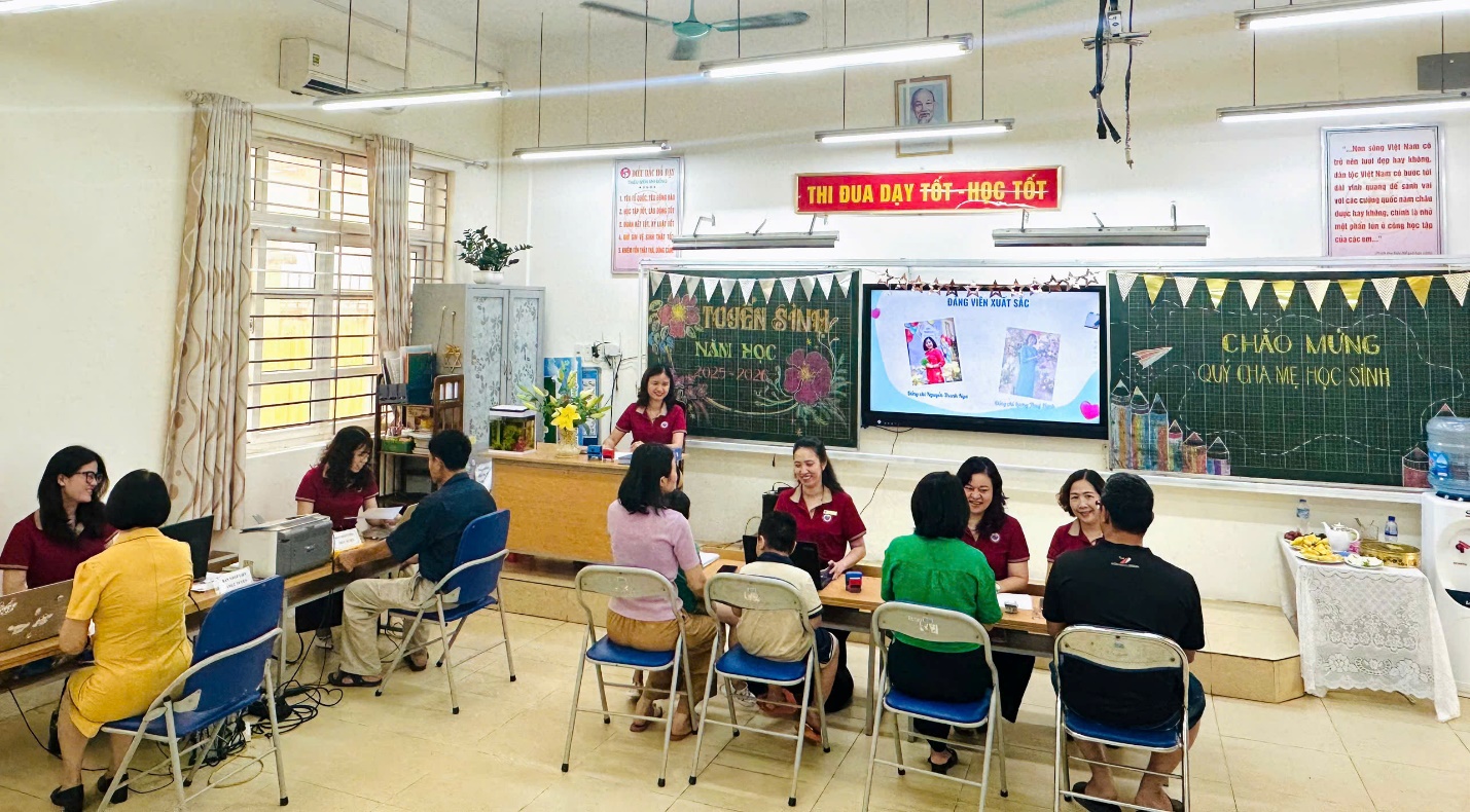 A group of people sitting at a table in a classroom

AI-generated content may be incorrect.