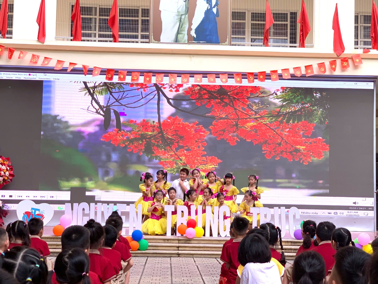 A group of children performing on stage

AI-generated content may be incorrect.