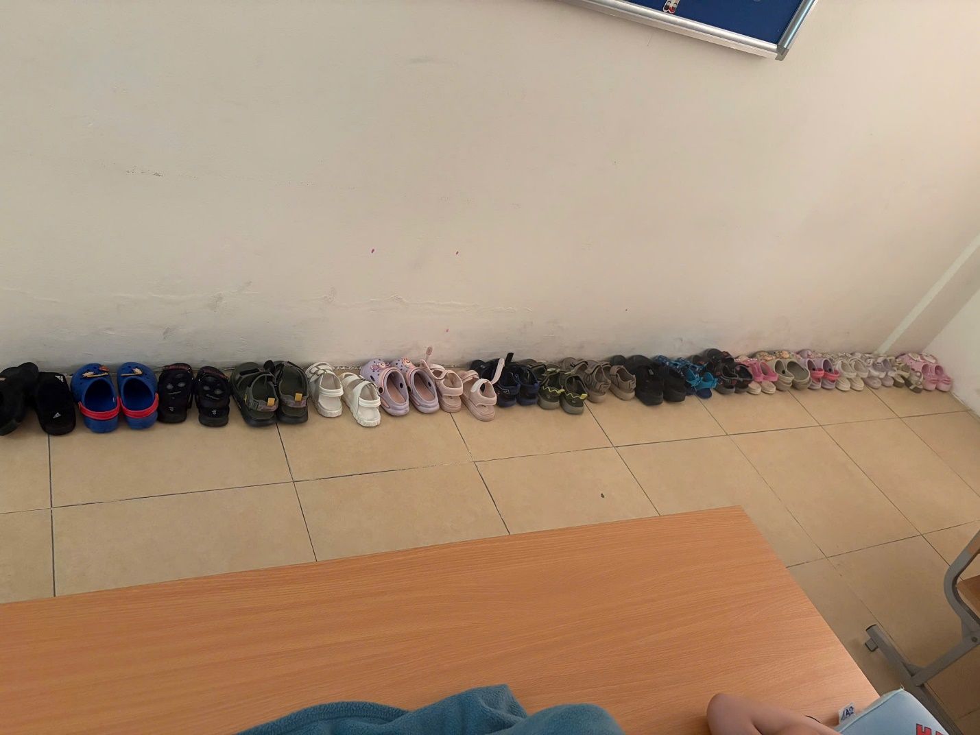 A row of shoes on the floor
AI-generated content may be incorrect.
