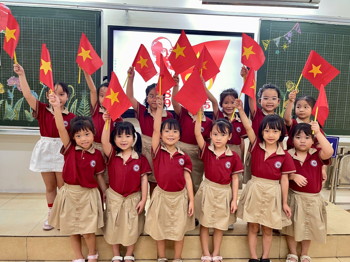 A group of children holding flags

AI-generated content may be incorrect.