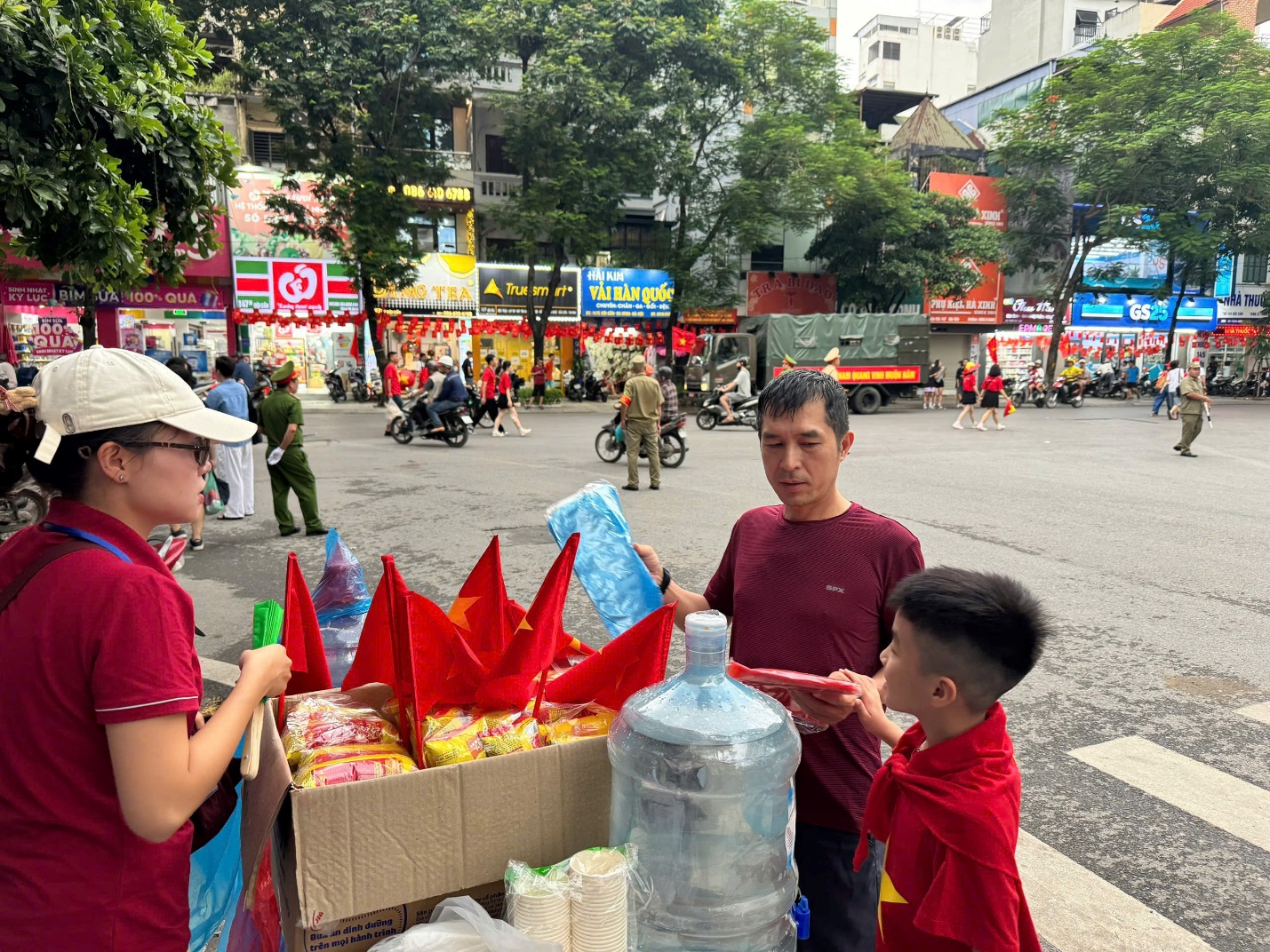 A group of people standing in a street
AI-generated content may be incorrect.