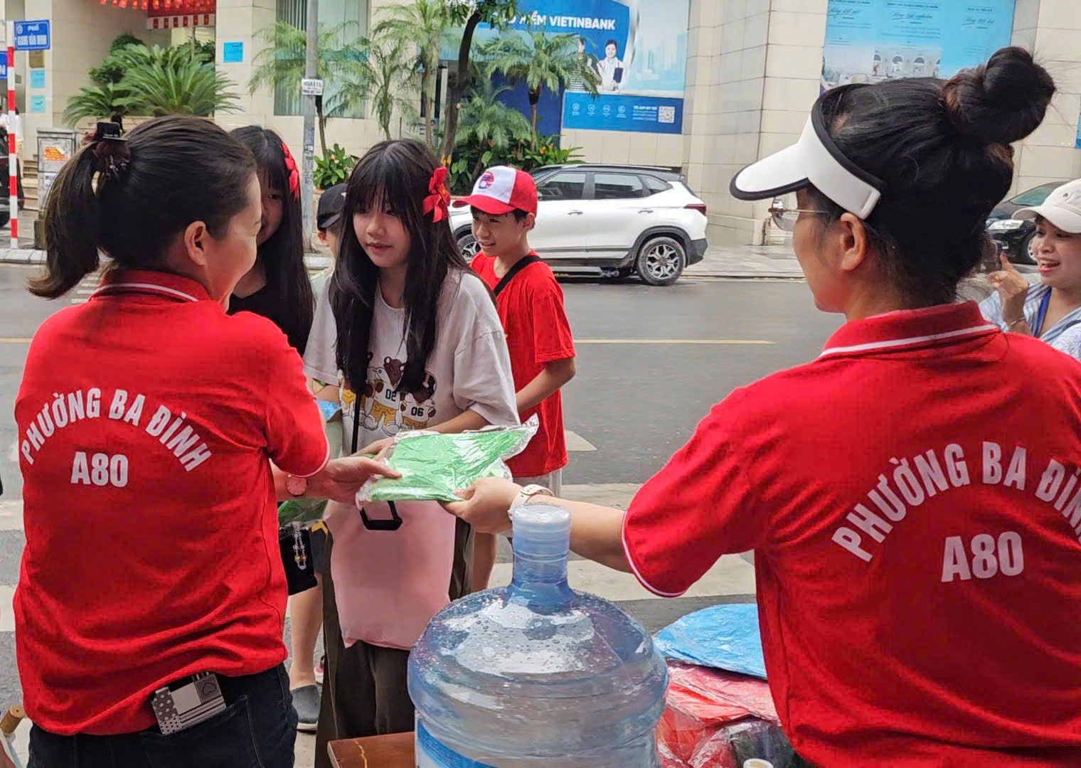 A group of people standing outside
AI-generated content may be incorrect.