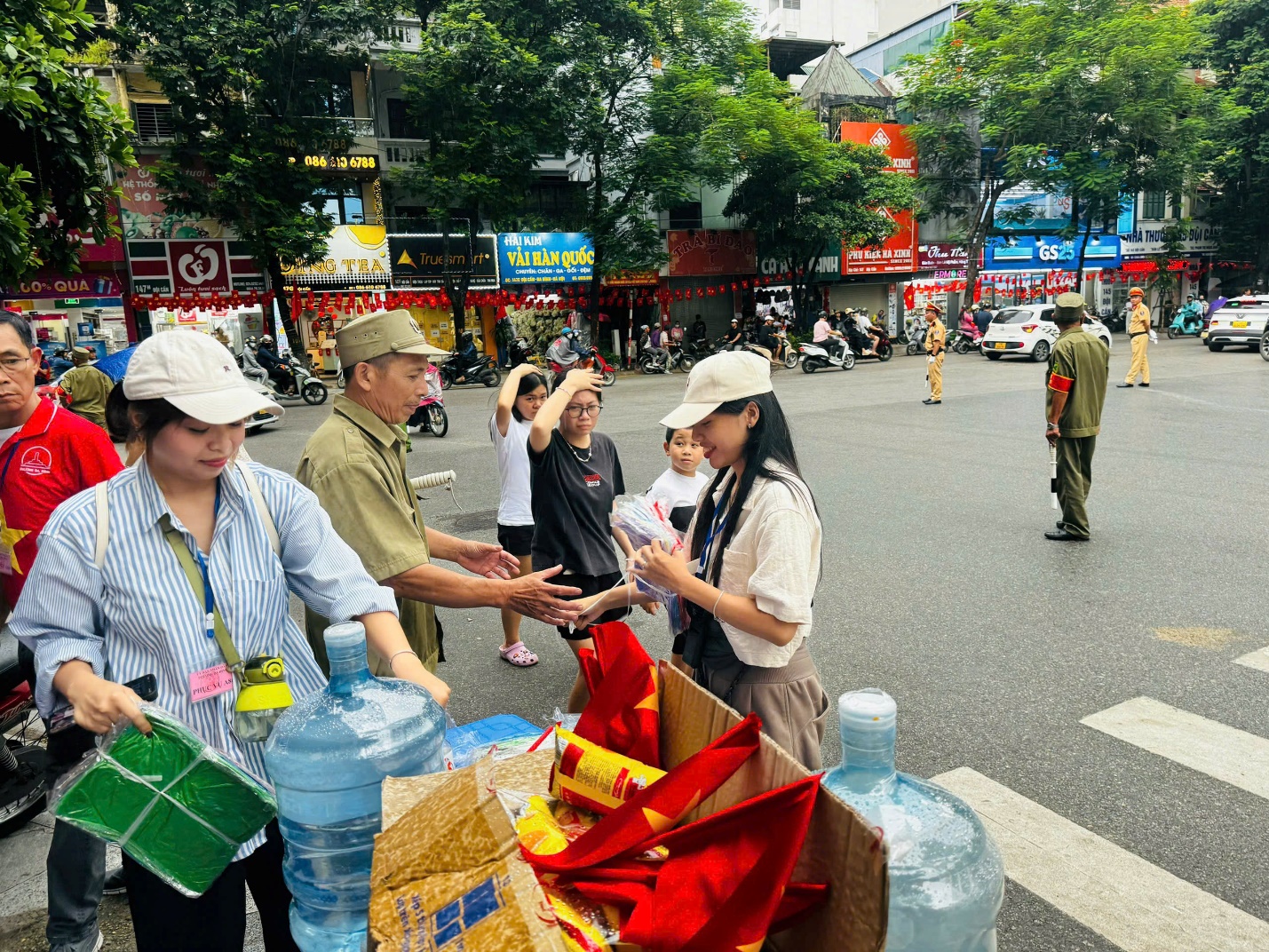 A group of people standing in a street
AI-generated content may be incorrect.
