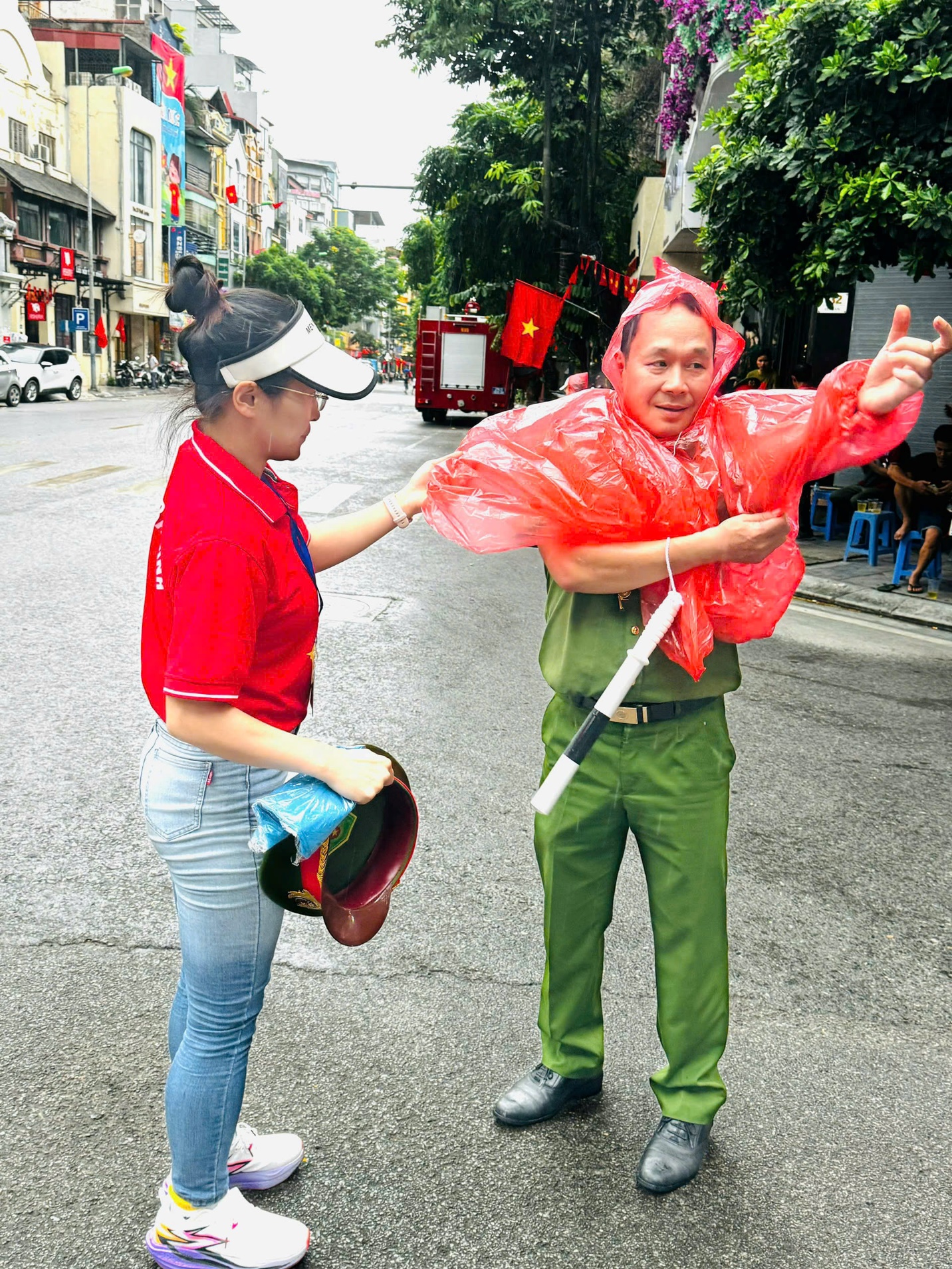 A person in a red shirt and green pants with a white hat and a plastic bag on his back
AI-generated content may be incorrect.