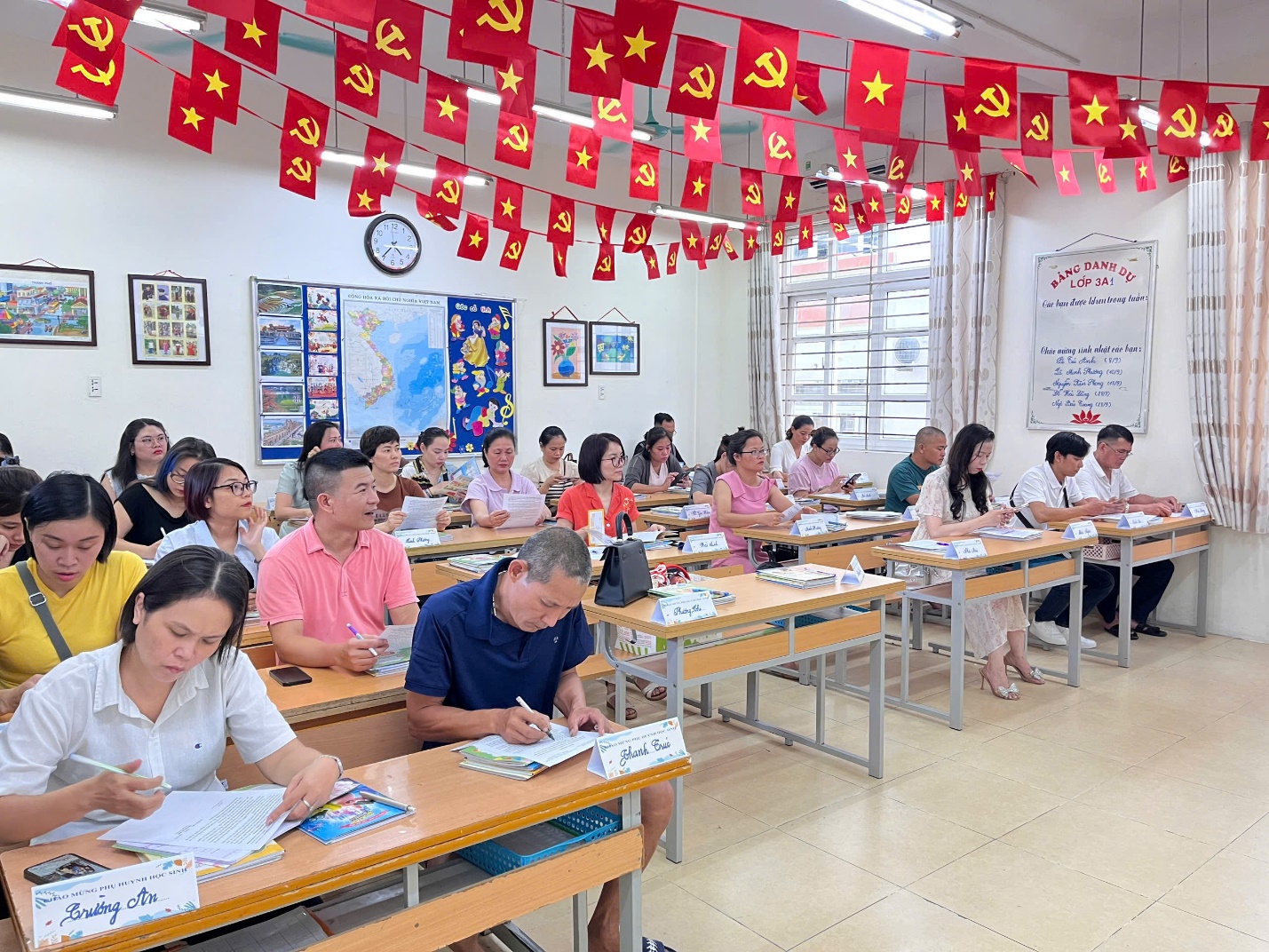 A group of people sitting at desks in a classroom

AI-generated content may be incorrect.