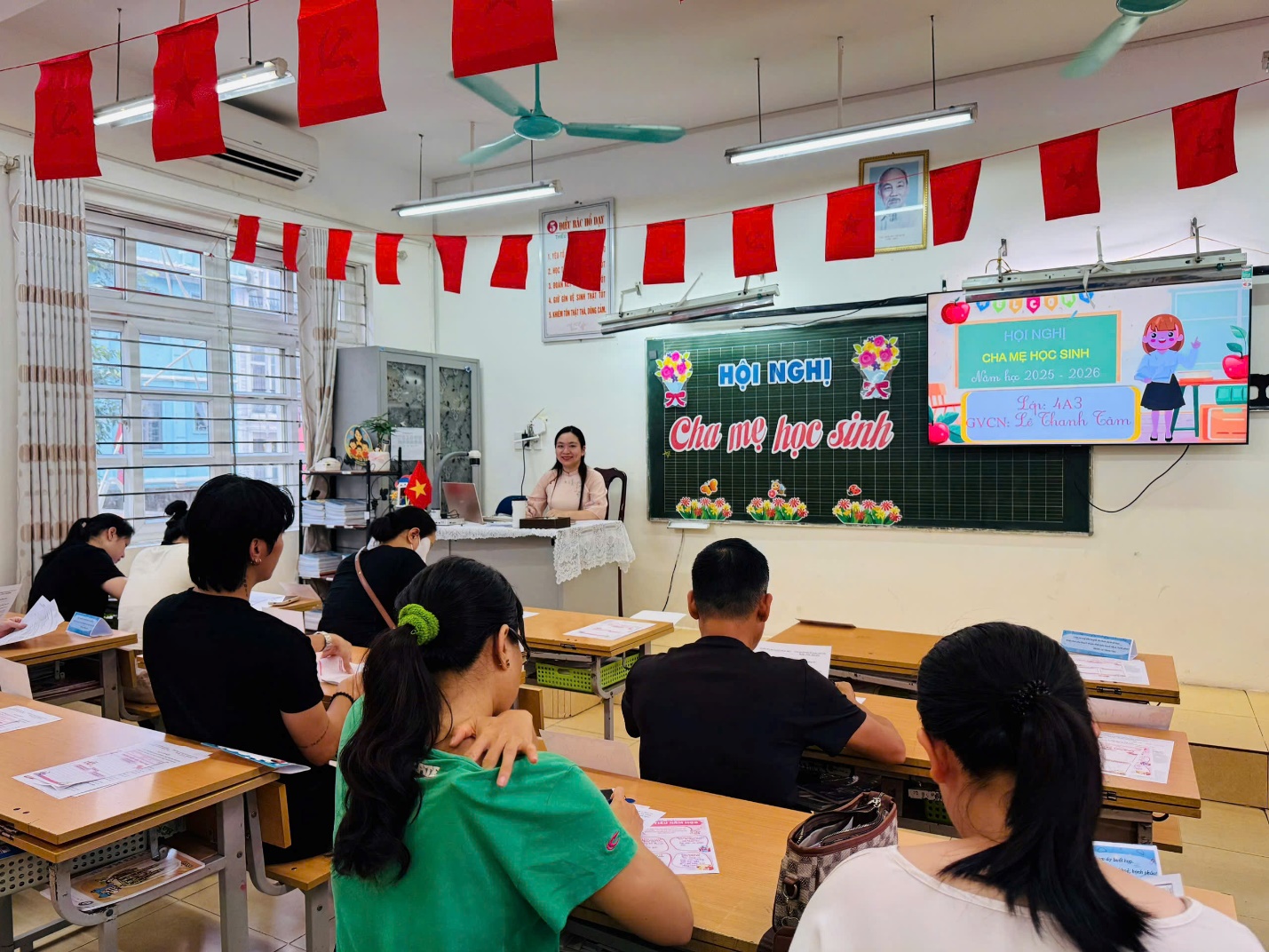 A group of people sitting at desks in a classroom

AI-generated content may be incorrect.