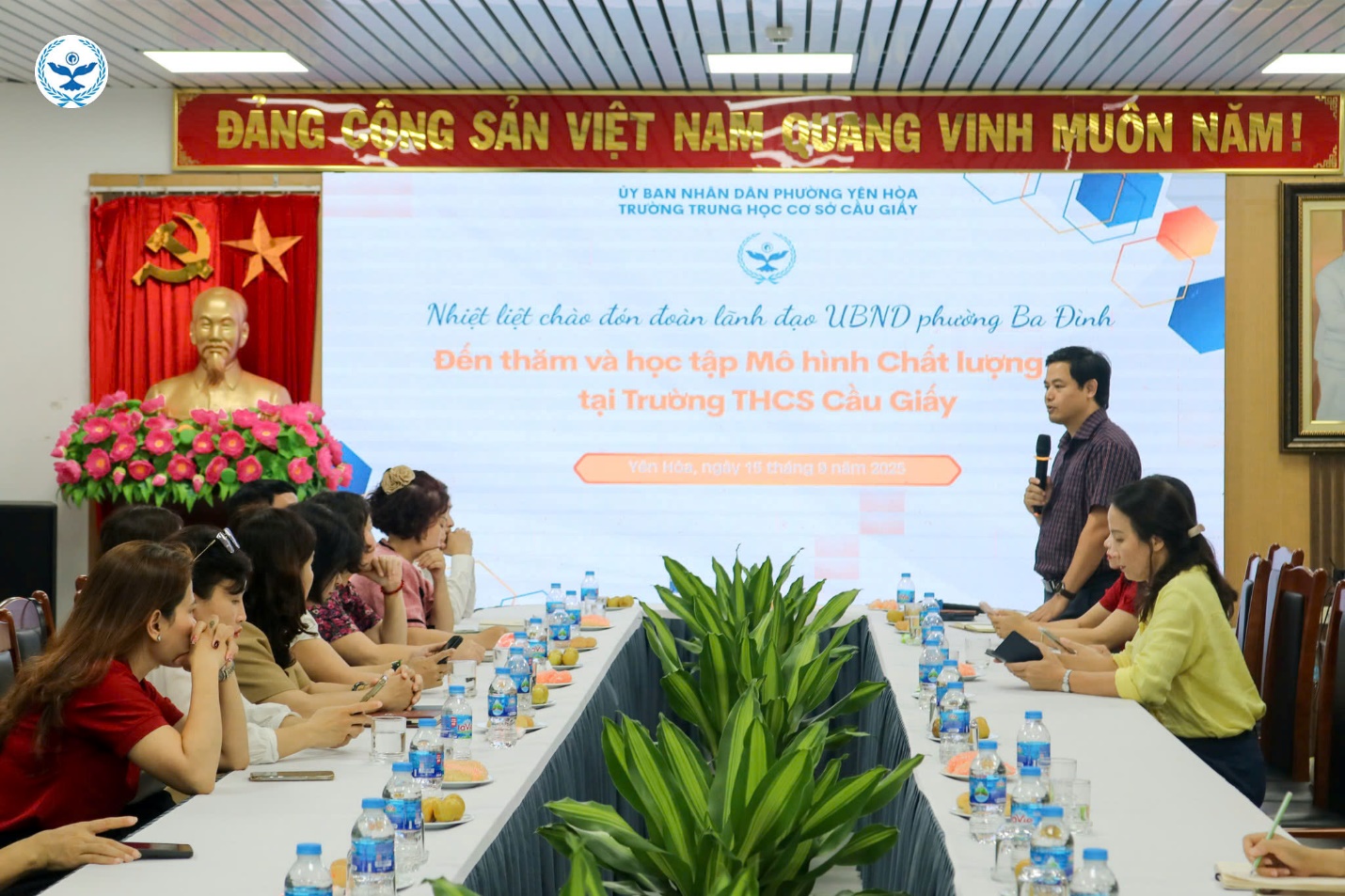 A group of people sitting at a table

AI-generated content may be incorrect.