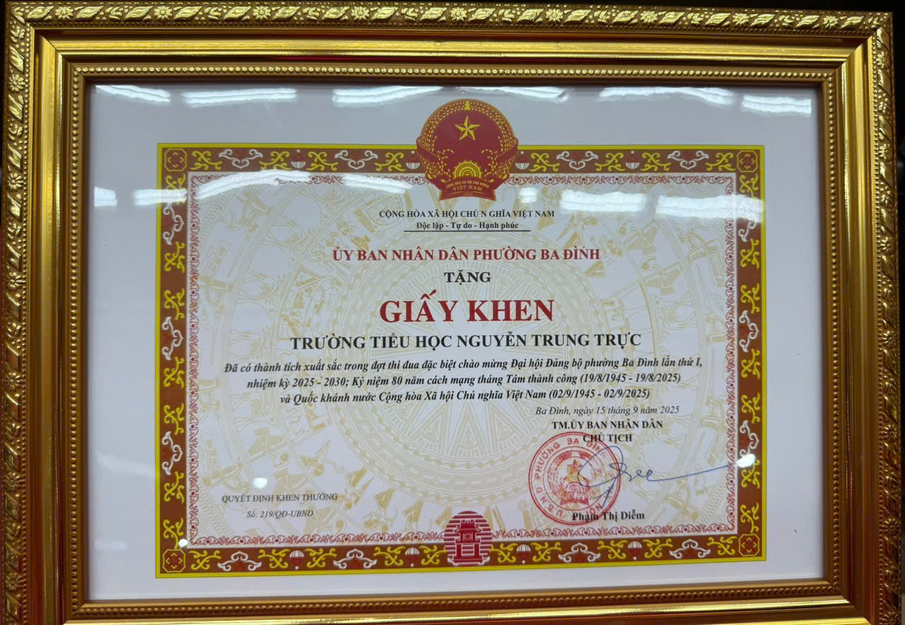 A gold framed certificate with red and gold text

AI-generated content may be incorrect.