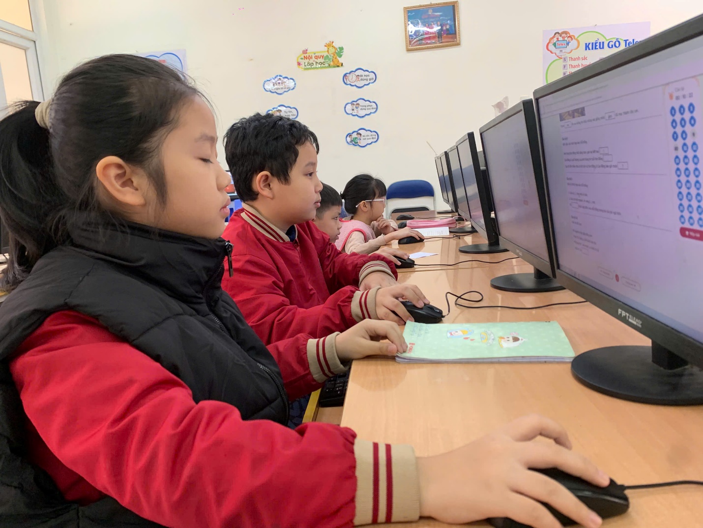 A group of children using computers

AI-generated content may be incorrect.