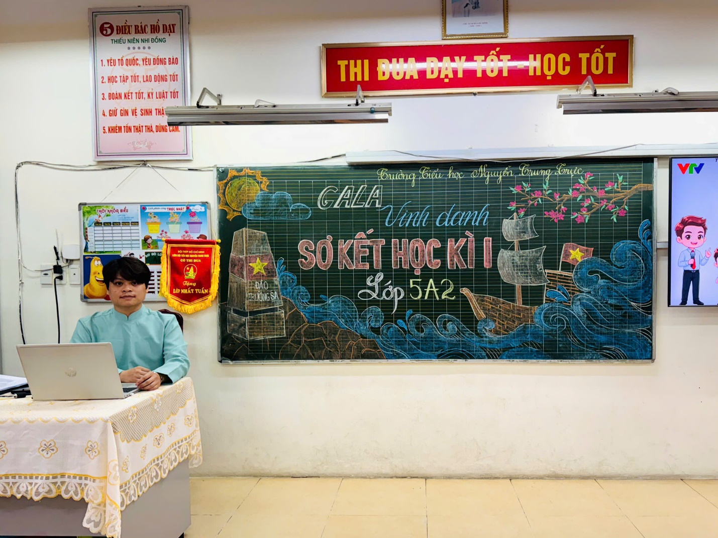 A person sitting at a desk with a computer

AI-generated content may be incorrect.