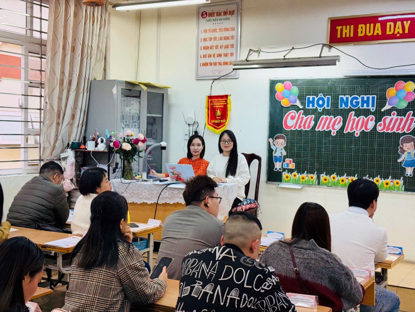 A group of people sitting at desks in a classroom

AI-generated content may be incorrect.