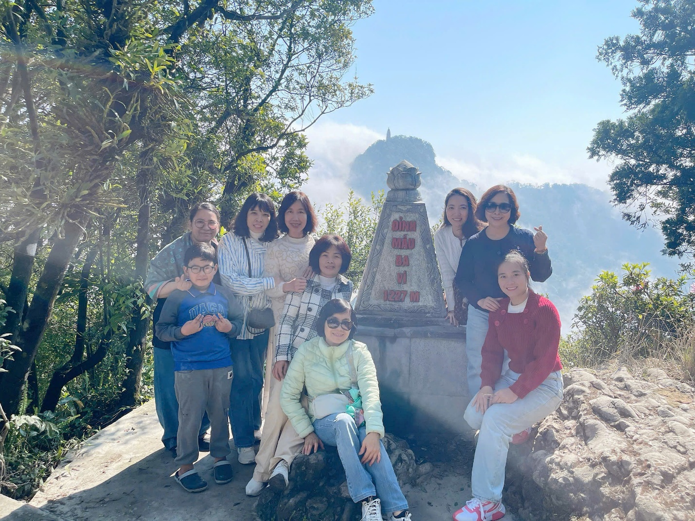 A group of people posing for a photo

AI-generated content may be incorrect.